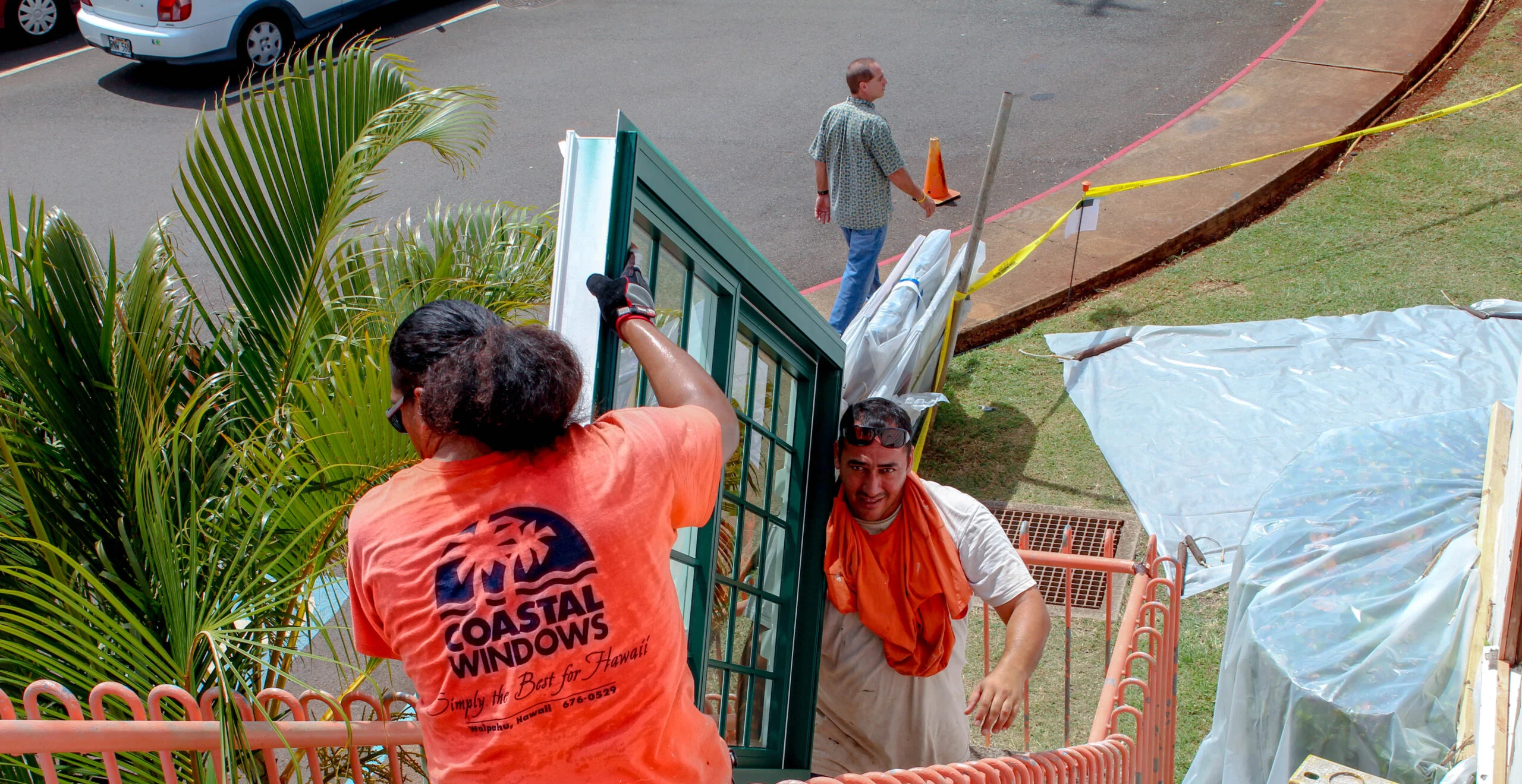 Coastal Windows installation team at work in a Hawaii home